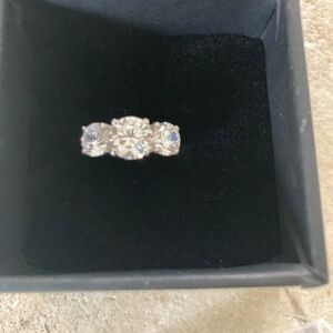 Ring 3.27 Ct Colorless Round 925+ simulated stone. 3-Stone Ring Size 6